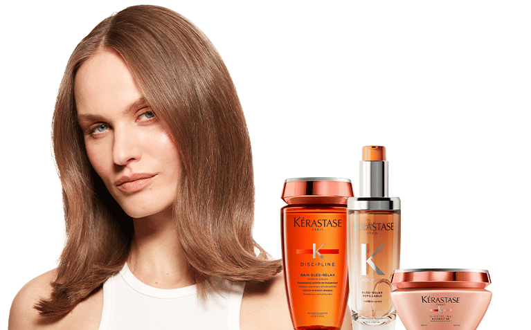 Kerastase Discipline model with hair care for frizzy hair.