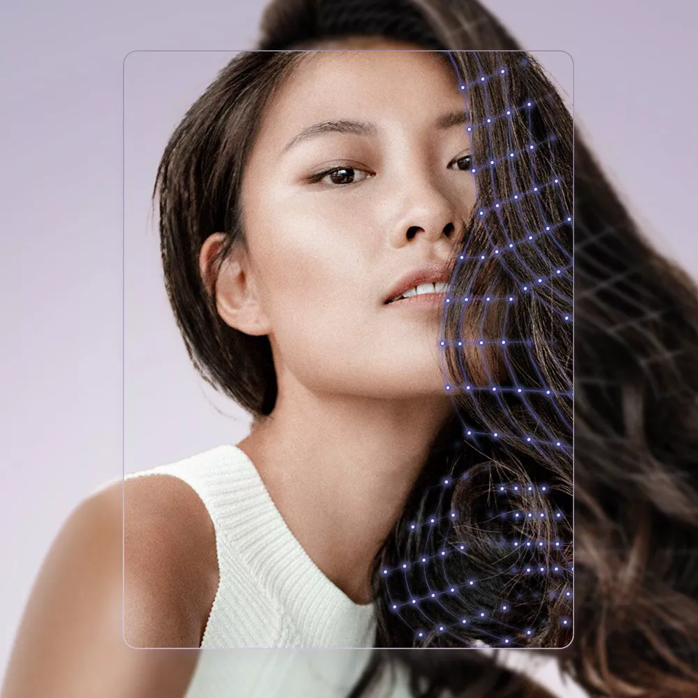 Asian woman with dark brown long hair showcases the beauty of healthy and well-maintained hair.