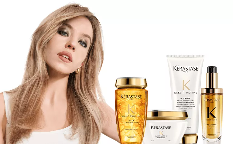 Kerastase Fusio Scrub model with hair care products for scalp care.