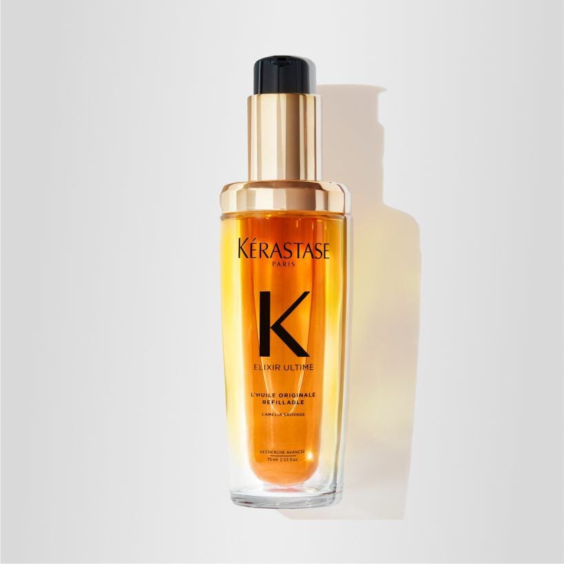 Redescubre el icónico aceite capilar Elixir Ultime de Kérastase, ahora recargable. Este aceite es la solución rápida que necesita el cabello opaco, proporcionando hidratación, suavidad, brillo y protección.