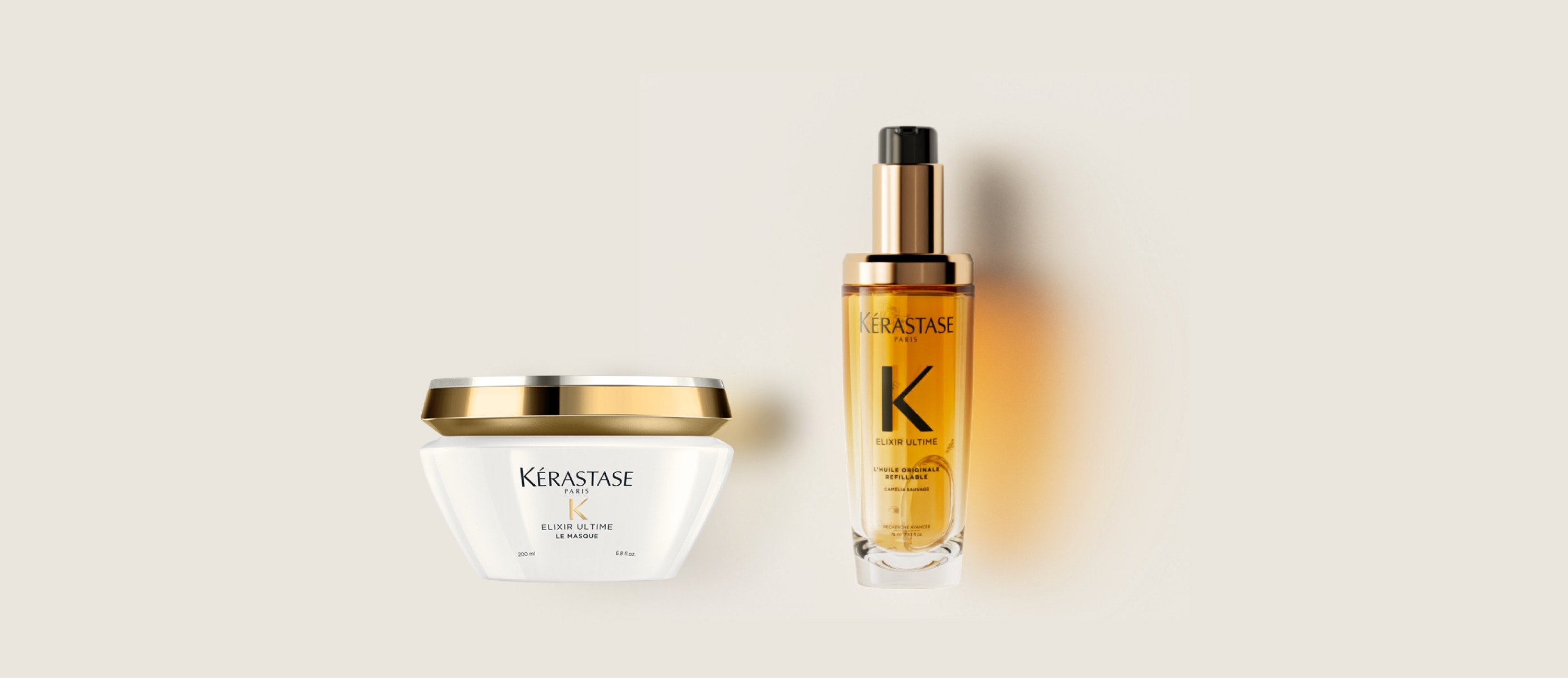 La mascarilla capilar Elixir Ultime y el nuevo aceite capilar recargable Elixir Ultime se muestran sobre un fondo beige puro.